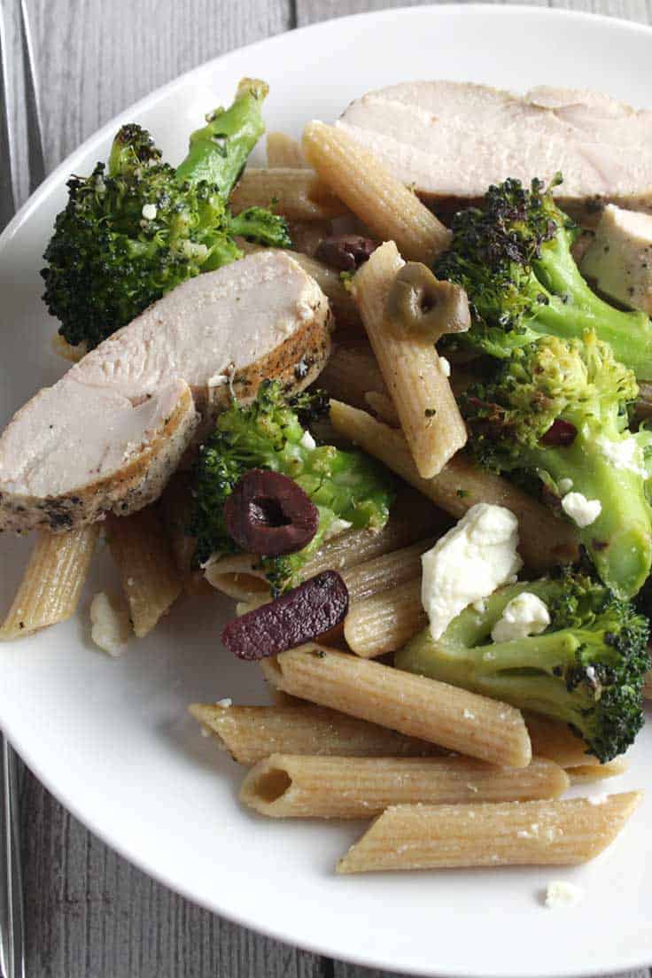 Grilled Chicken Broccoli and Garlic Penne on a plate.