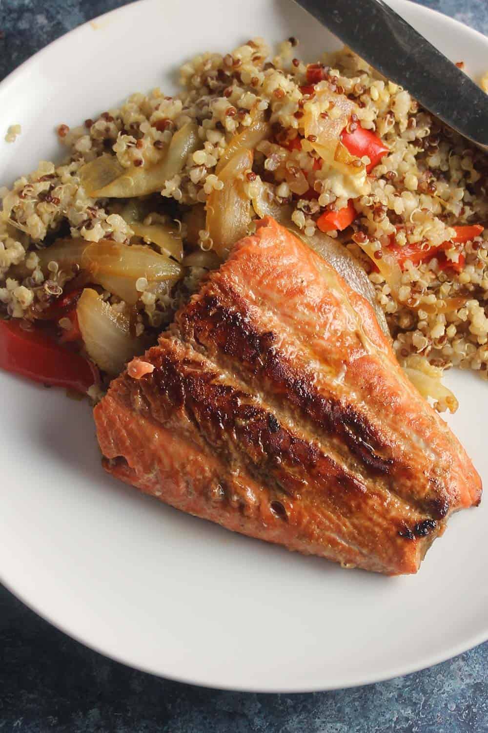 salmon with plated with quinoa.