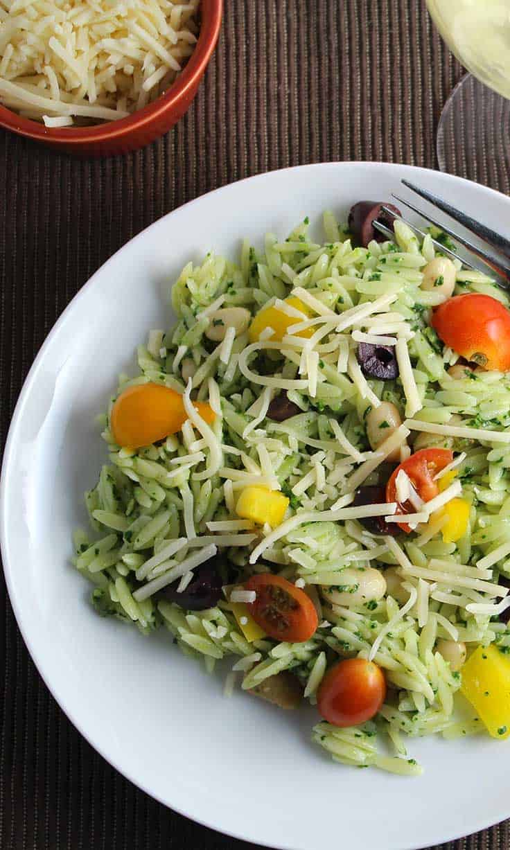 Orzo Salad with Kale Pesto recipe can be a great contribution to a picnic or summer potluck. Also makes a tasty vegetarian main course.