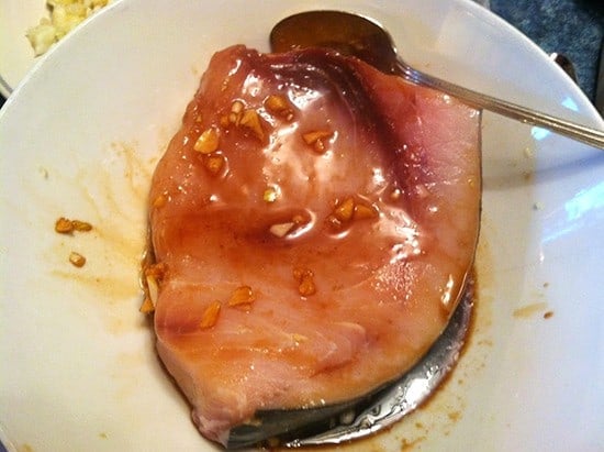 swordfish marinating with garlic and soy.