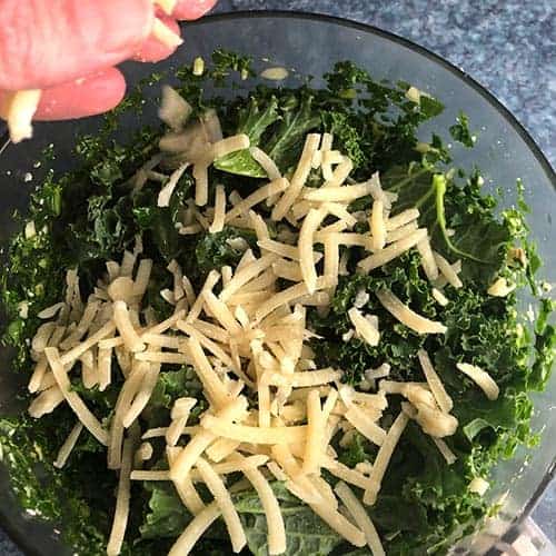 adding cheese for kale pesto