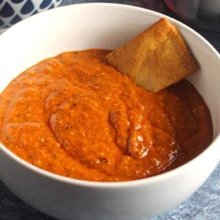 muhammara red pepper dip in a bowl.