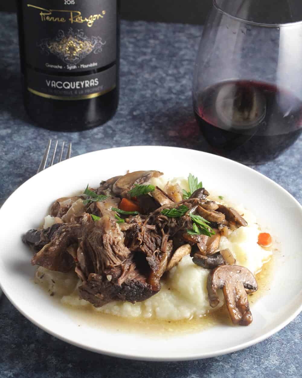 short ribs served with red wine.