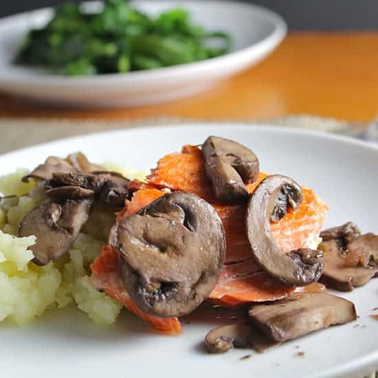 Salmon with Mushrooms served with mashed potatoes.