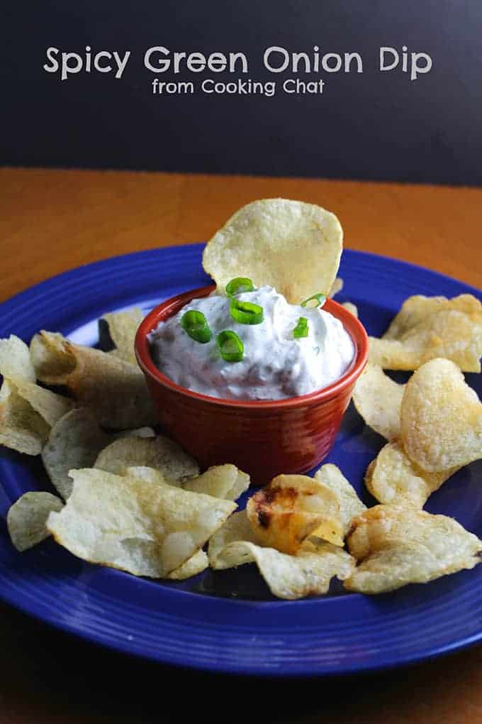 potato chip scooping some green onion dip