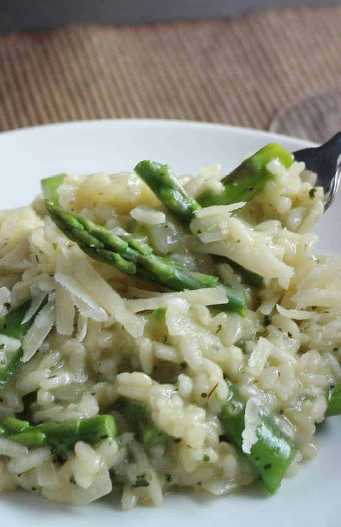 Early Spring Risotto recipe features asparagus, snow peas and tasty Parmigiano cheese. Dig into this creamy dish and forget about winter!