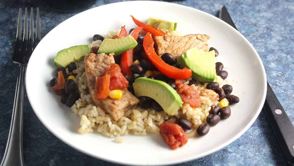 plate of skillet black beans and pork.