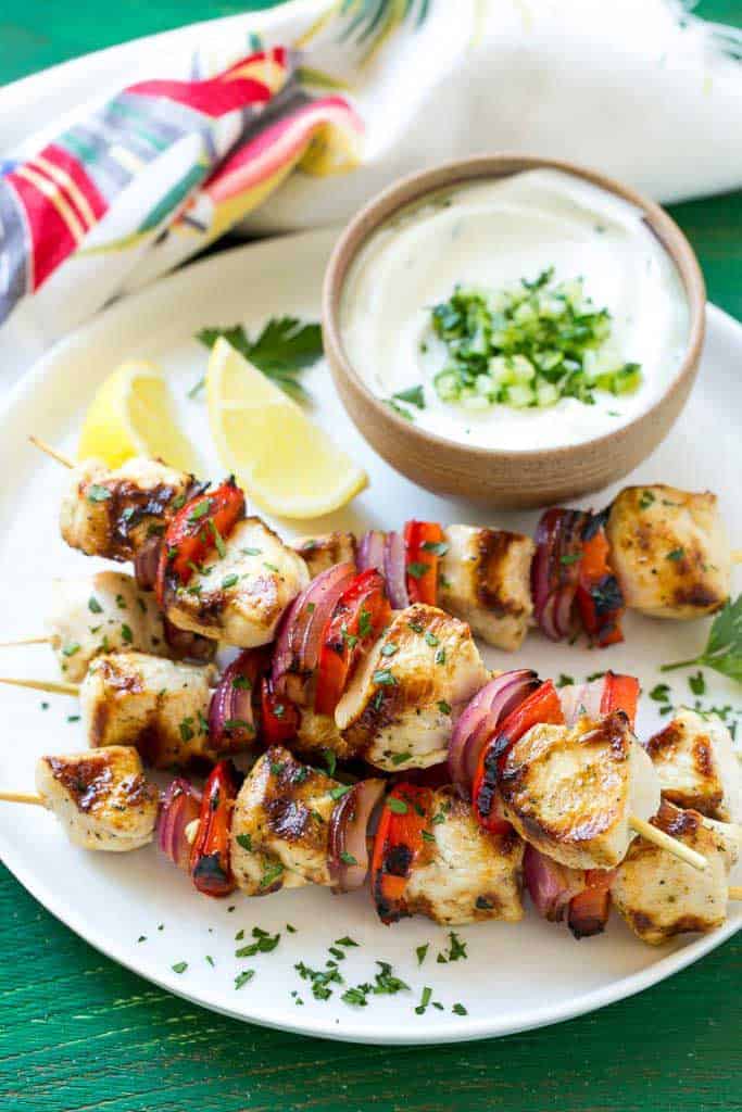 Greek chicken kabobs from Dinner at the Zoo, picked for Grilling Recipes for Labor Day Weekend roundup.