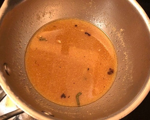 making gravy for herb roasted turkey.
