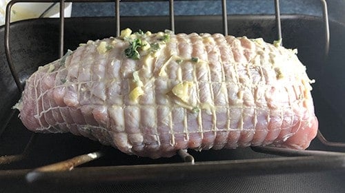 turkey breast with herb butter, ready to go into oven.