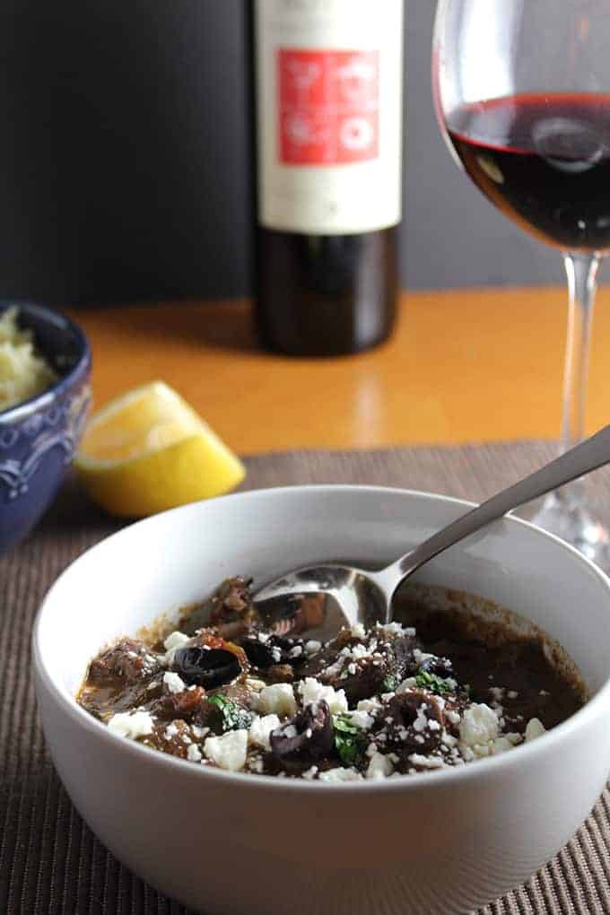 Greek Lamb Stew has slow cooked, tender lamb, topped with some feta cheese and olives, wonderful served with a Greek wine. From Cooking Chat wine red wine pairings roundup.