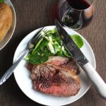 strip roast beef recipe topped with a simple red wine sauce.