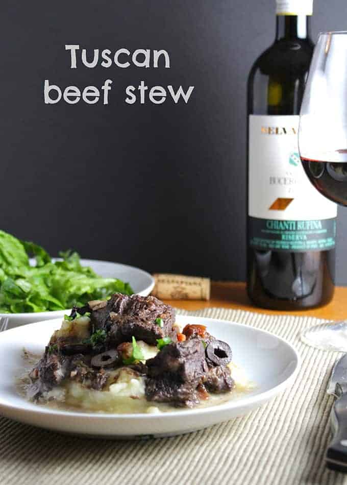 Tuscan beef stew recipe, with beef so tender after a long simmer in red wine, paired with a Chianti. A Cooking Chat red wine pairings pick.