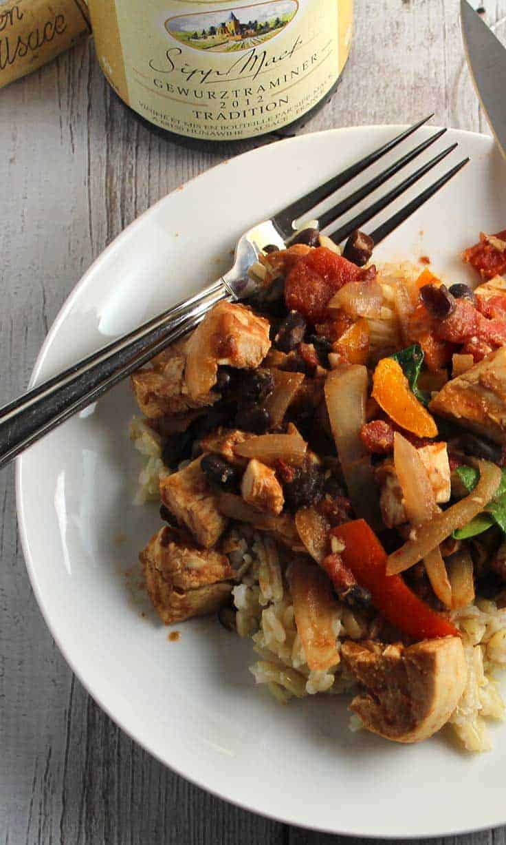 Chipotle Chicken and Black Beans recipe packs some good spicy kick. Pair with a white wine that has a touch of sweetness.