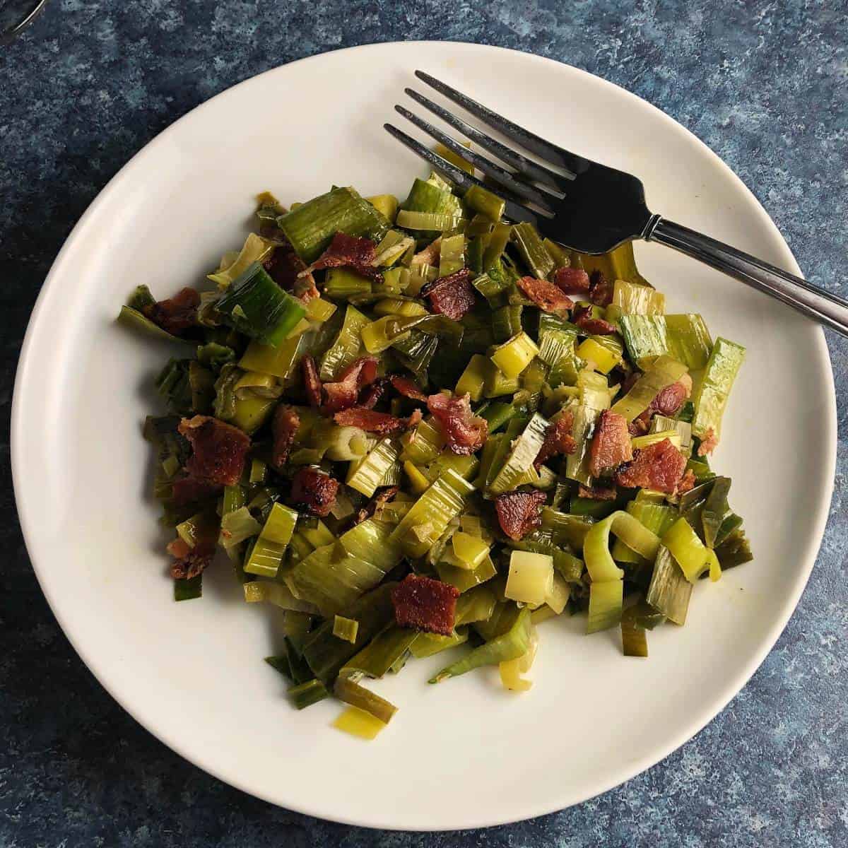 leek green tops with bacon