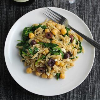 Greek Orzo with spinach, olives and feta cheese.