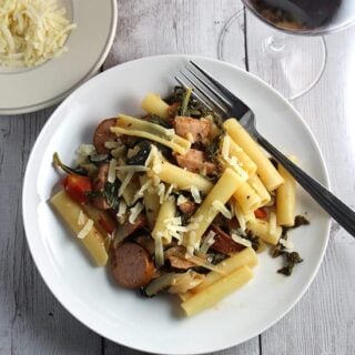 pasta with chicken sausage and kale paired with a red Italian wine.