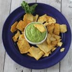 plate with kale pesto dips and chips.