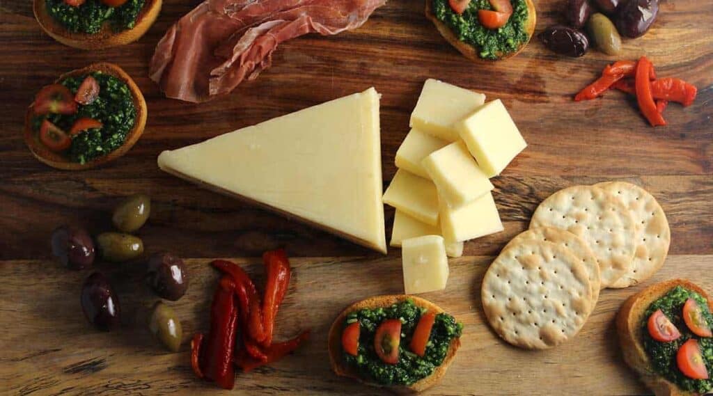 Easy Holiday Cheeseboard with Kale Pesto Crostini