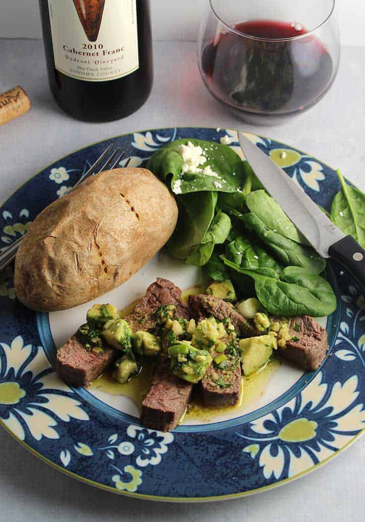 roasted sirloin steak topped with a delicious avocado sauce recipe, served with a Cabernet Franc wine.