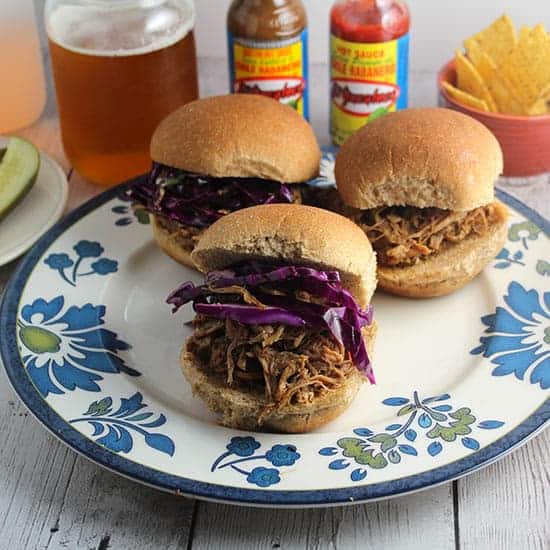 Spicy Pulled Pork Sliders served with an IPA style beer.