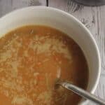 Roasted Root Vegetable Soup recipe, paired with red wine for a comforting dinner.