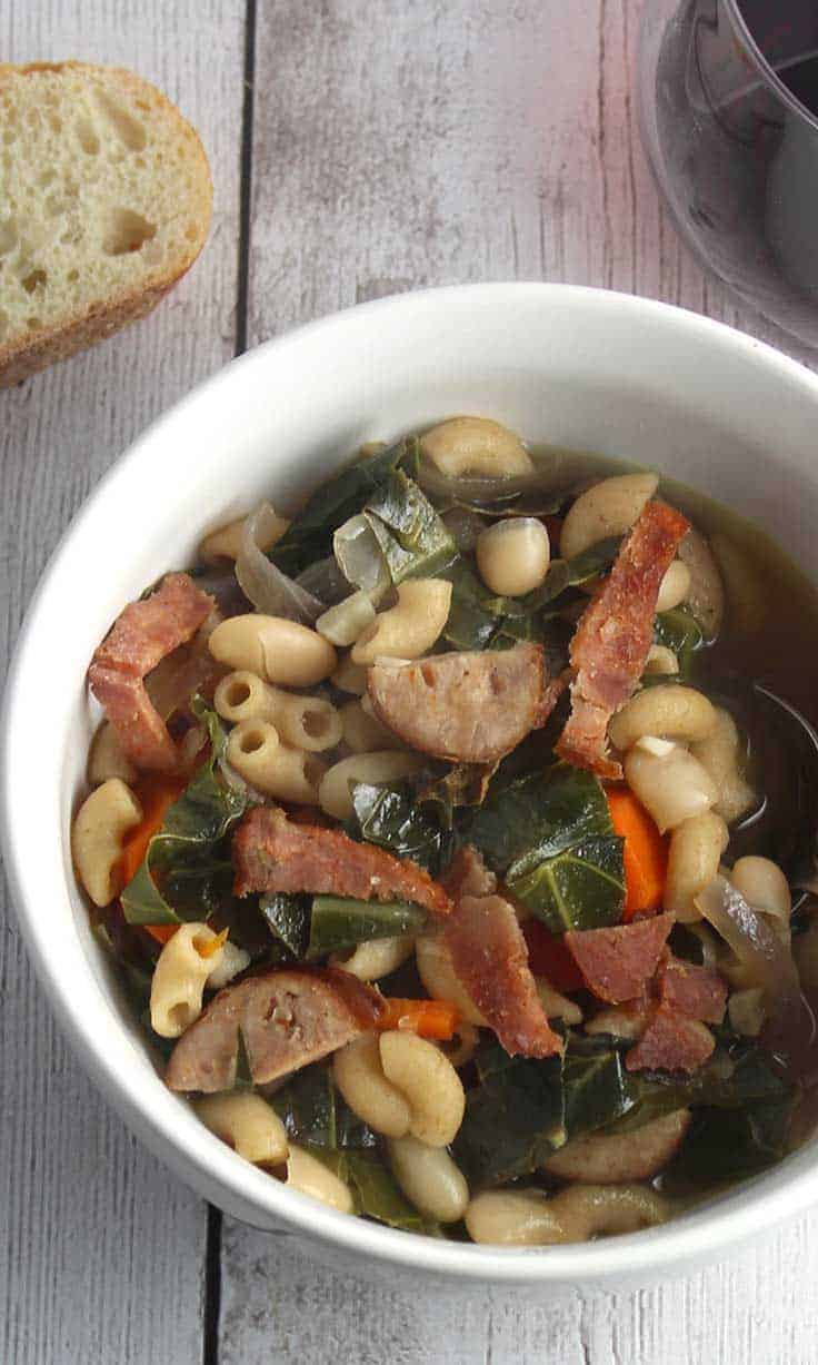 bowl of collard greens and sausage soup.