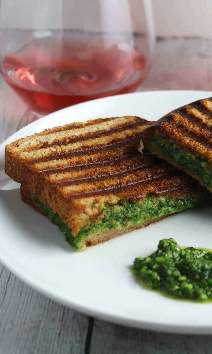 kale pesto grilled cheese is easy to make and full of flavor! serve with a rosé wine for a relaxing weekend lunch.