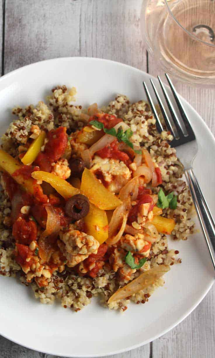 Tomato and Tempeh Skillet is a quick and flavorful vegan recipe making good use of the cured soybean product.