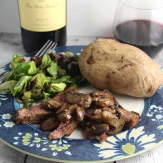 ribeye with mushrooms and a Duckhorn Merlot.