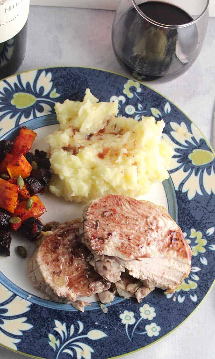 Roast Turkey Breast topped with a savory sweet Cranberry Merlot Sauce for a tasty alternative to traditional turkey gravy. #Thanksgiving