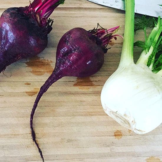 beets and fennel on a cutting board.