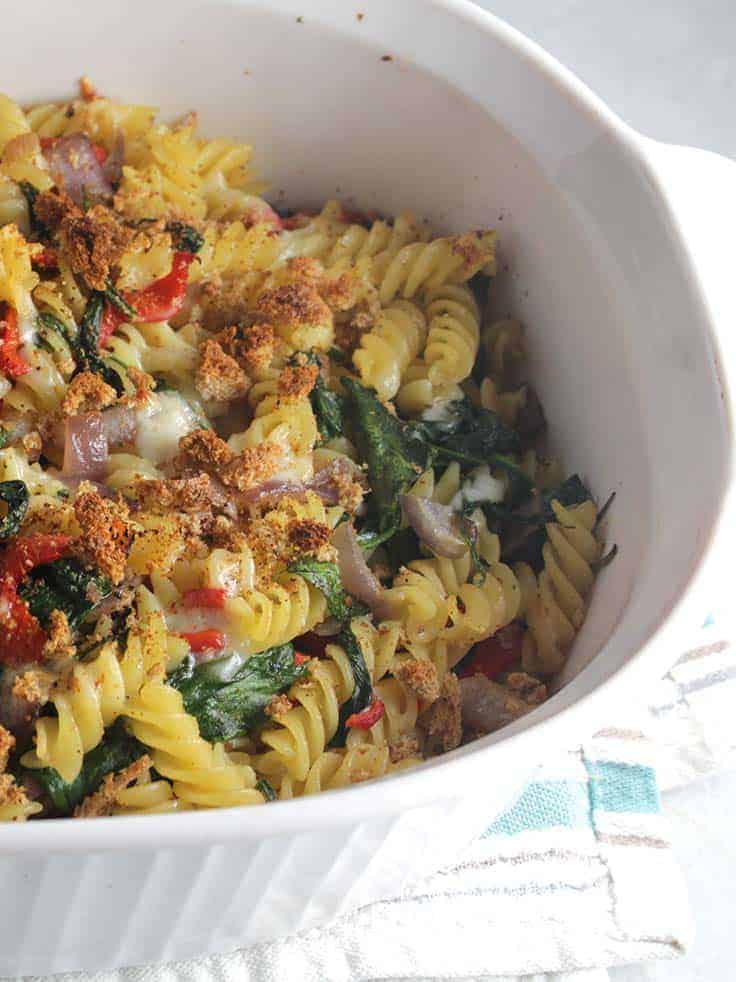 vegetarian baked pasta in a white casserole dish.