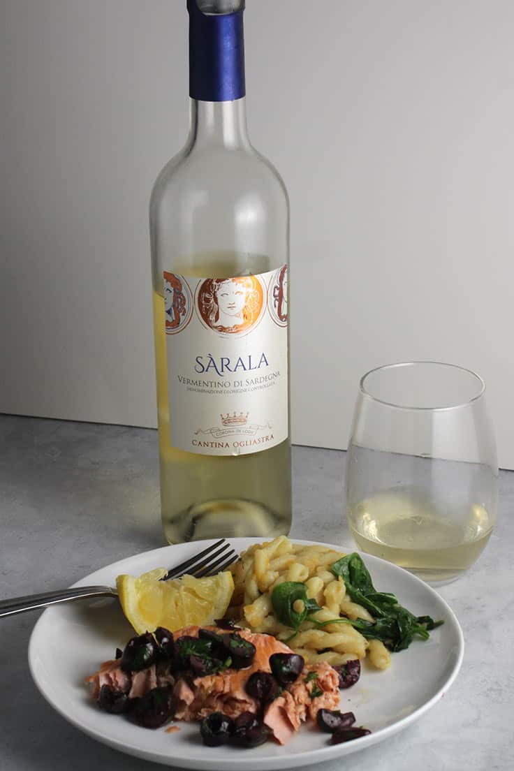 Sarala Vermentino white wine from Sardinia has lemon fruit flavor with almond notes. Good served with salmon with lemon olive relish. #wine #winepairing