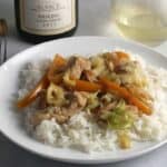 pork and cabbage skillet over rice, served with a Riesling.