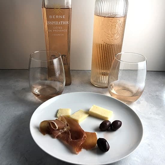 two Provence rose wines paired with cheese, ham and olives.