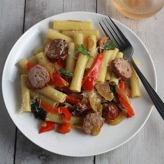 pasta with sausages, red peppers and greens