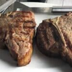 Bistecca alla Fiorentina (Florentine Steak) on a platter.