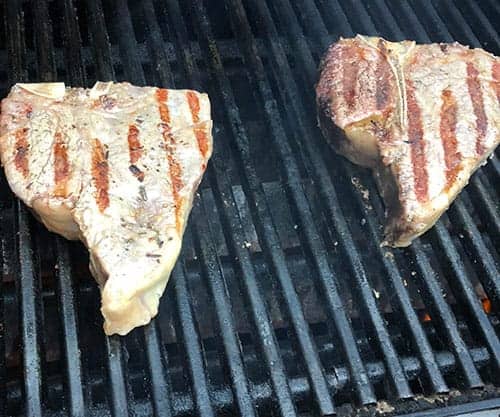 porterhouse steaks on the grill.
