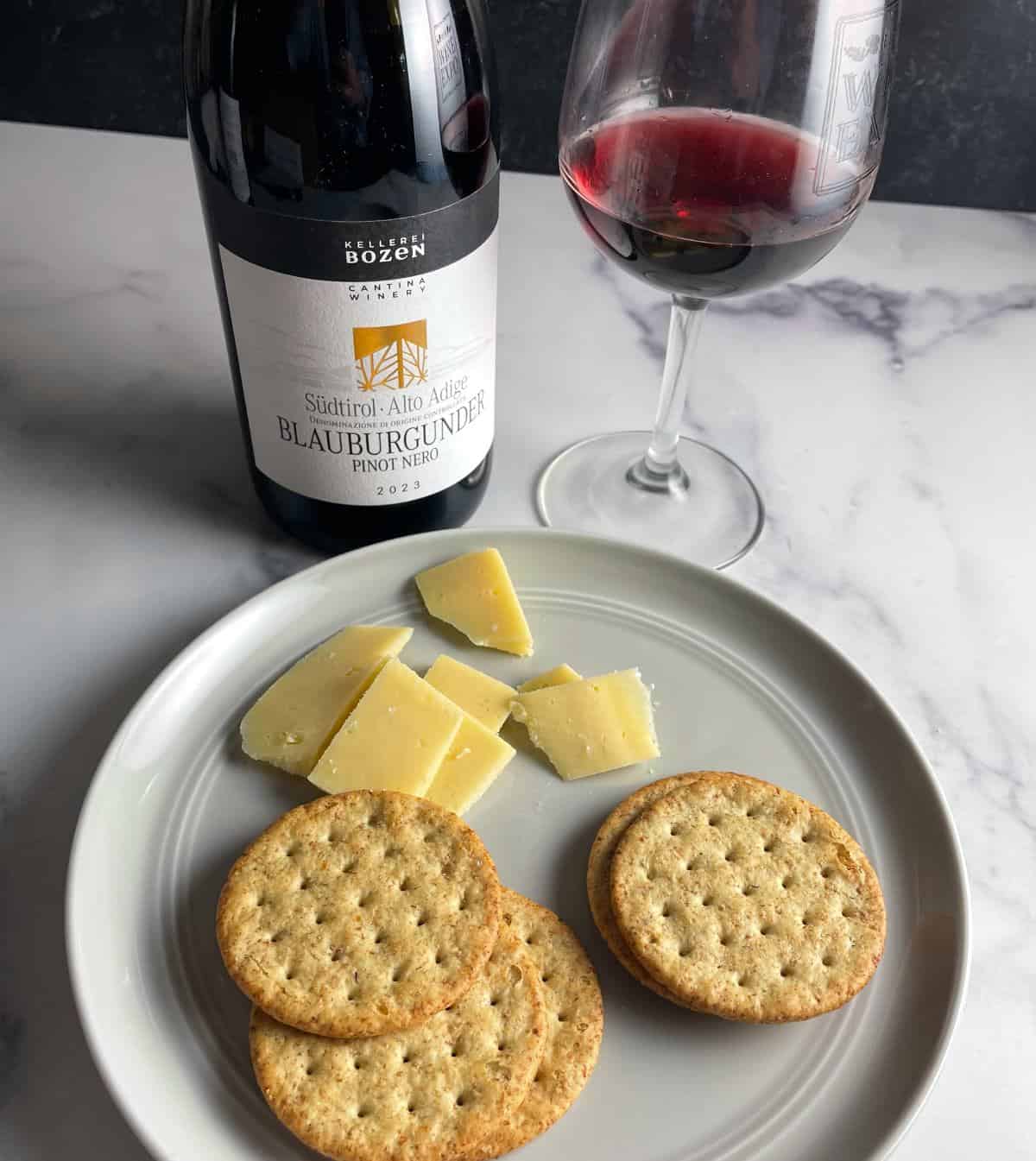 Pinot Nero with cheddar cheese.