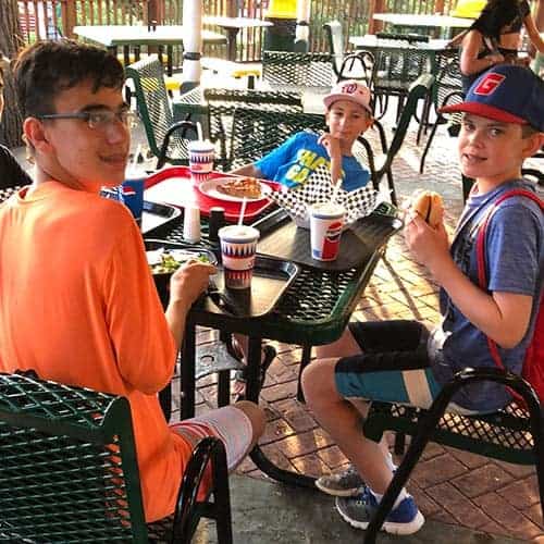 boys eating dinner at the Trellis, a restaurant at Canobie Lake Park.