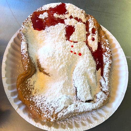 fried dough with powdered sugar