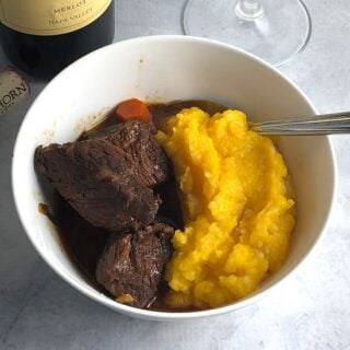BBQ beef stew served with butternut squash purée.