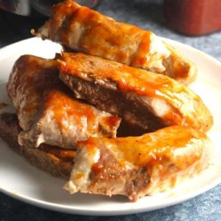 boneless pork ribs with bbq sauce, plated