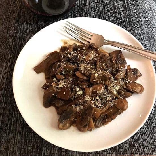 sauteed porcini mushrooms on a plate