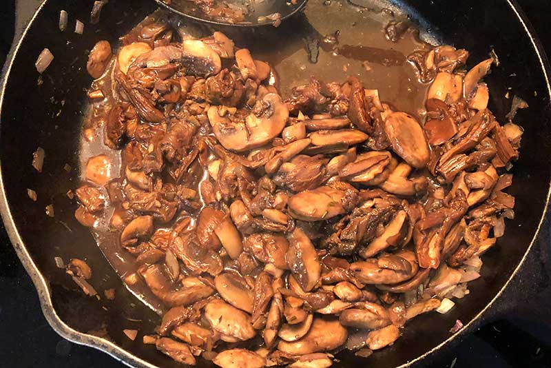 porcini mushrooms in a skillet.