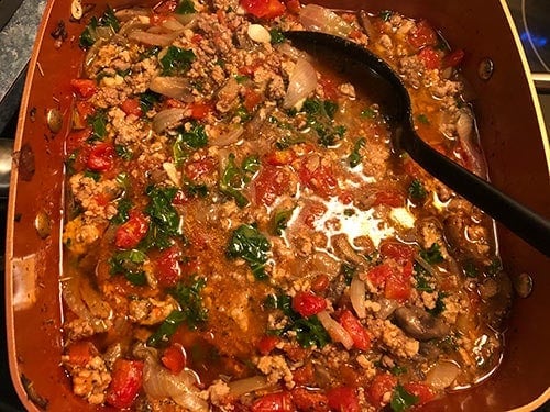 Healthy Bolognese Sauce cooking on the stove top.