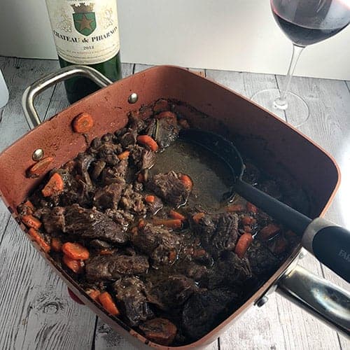 beef daube in copper pan.