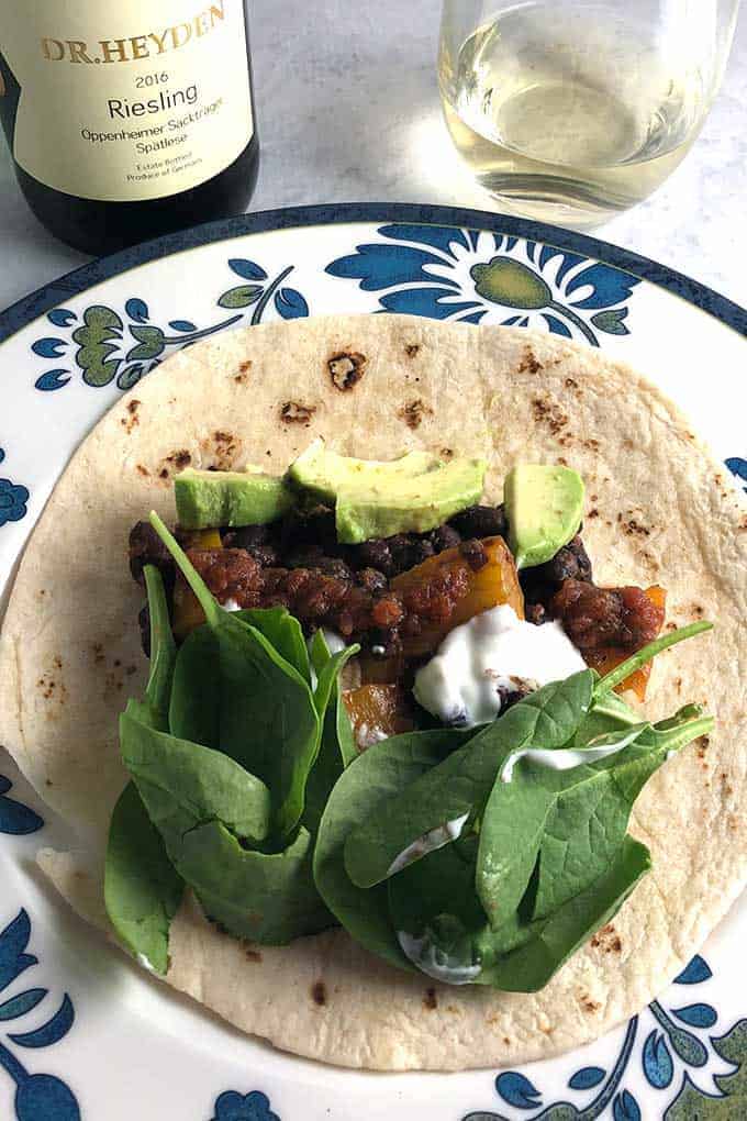 Easy Black Bean Tacos with Avocado recipe, with chipotle salsa, is a tasty weeknight meal. Pairs well with German Riesling. #tacos #blackbeans #Riesling #sponsored