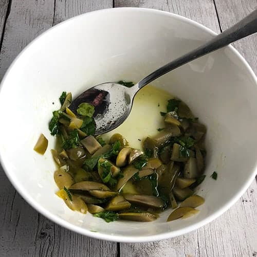 bowl with olive lemon relish for cod.